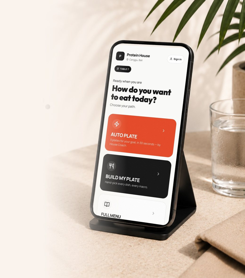 A phone on a restaurant table showing the Fuelly ordering screen